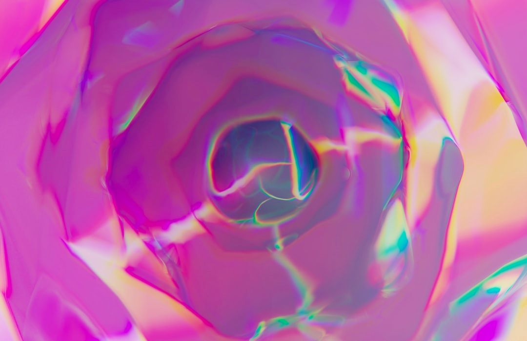 Nanoknife terapi symboliseret ved abstrakt spiralagtig figur med rosa toner og lys-blåt center.