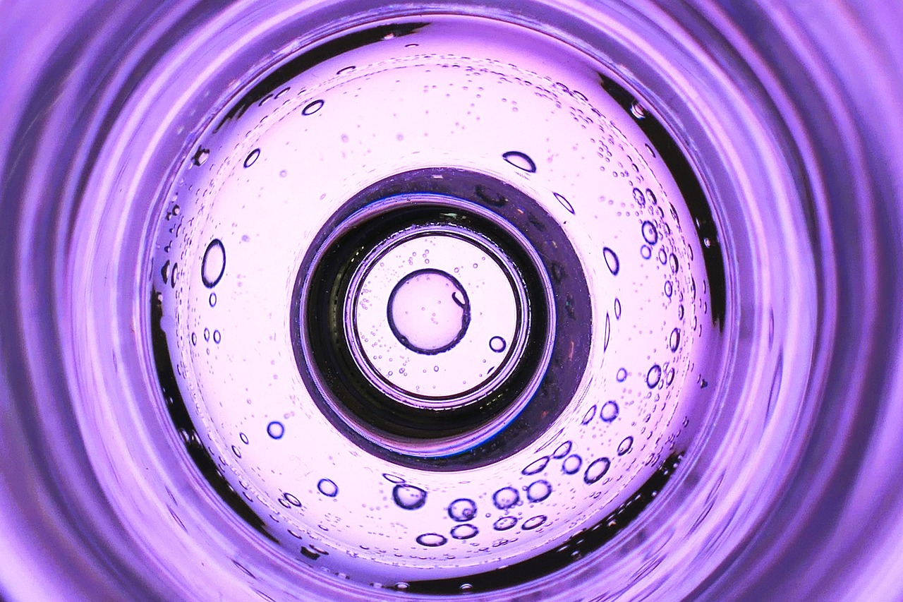 Svimmelhed symboliseret ved lilla cirkler af varierende tykkelse.