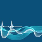 Guide til sitet symboliseret ved hjertediagram med blå baggrund. og en bølgefigur hen over skærmen i turkis.