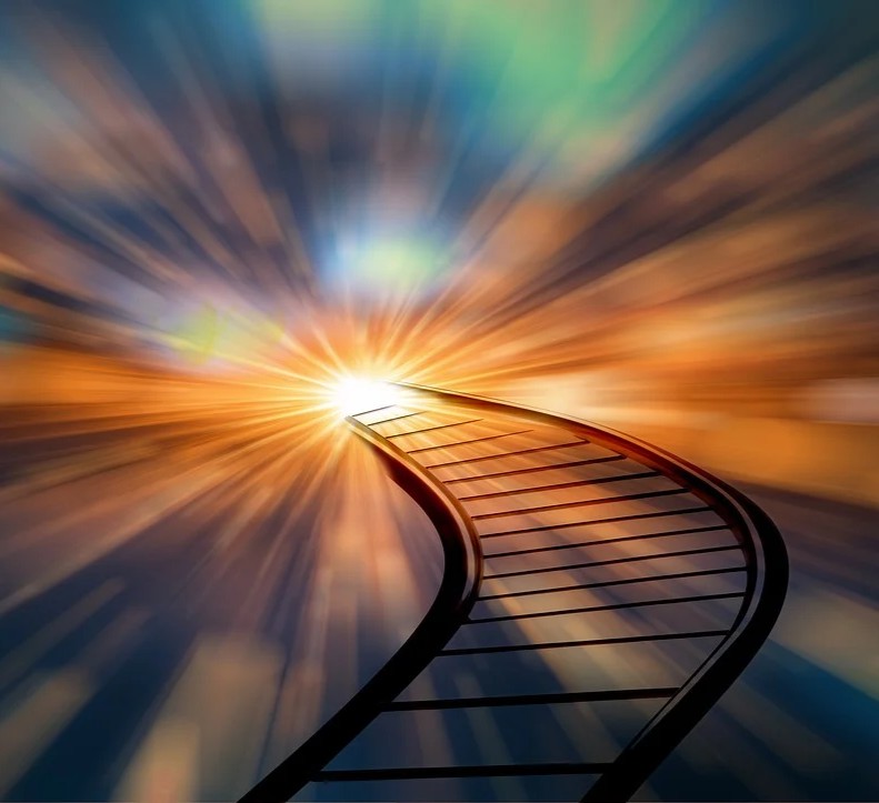 Følelser alment symboliseret ved en jernbaneskinne der snor sig mod et strålende lys.