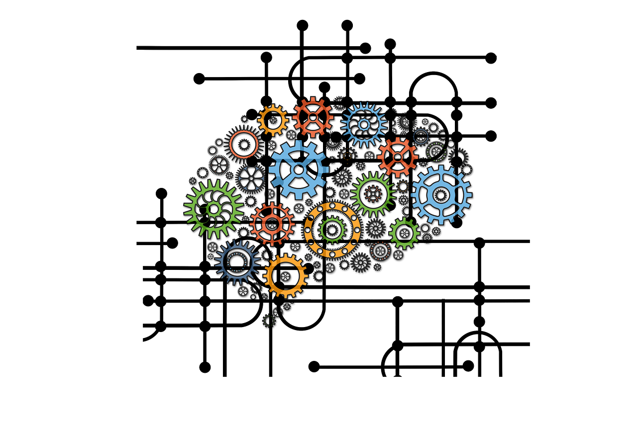 Neurologisk undersøgelse symboliseret ved en skematisk fremstilling af en hjerne vist med farvede tandhjul i forskellig størrelse. Over dette et net af sorte streger med prikker i enderne.