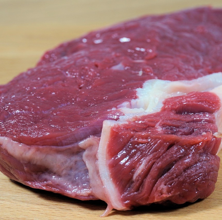 Neutropeni - lavt immunforsvar - symboliseret ved et stykke råt oksekød.