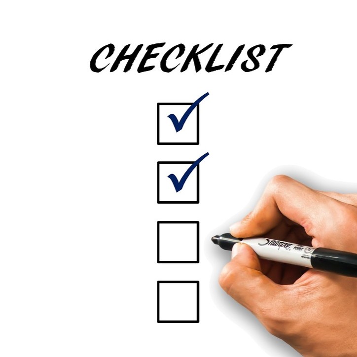 Spørgeskamaundersøgelse symboliseret ved en checkliste med afkrydsning.