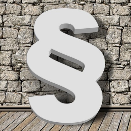 Import af medicin symboliseret ved et paragraftegn i hvidt.