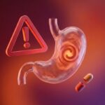 Honikiol symboliseret ved en advarselstrekant i rød, en mavesæk og en kapsel der er halveret. Alt i rødt.