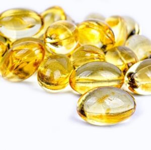 Quiz - Vitamin-D symboliseret ved nogle gyldne kapsler.